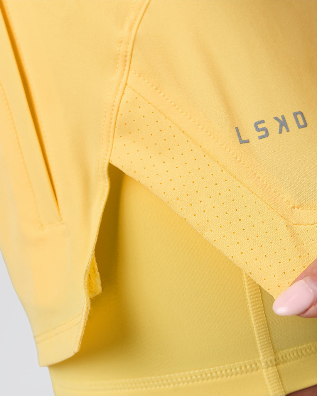 Woman wearing Challenger 3" Lined Performance Short - Lemon | Model:Issy | Size:XS - view 10