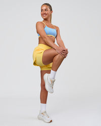 Woman wearing Challenger 3" Lined Performance Short - Lemon | Model:Issy | Size:XS | Thumbnail Index: 11