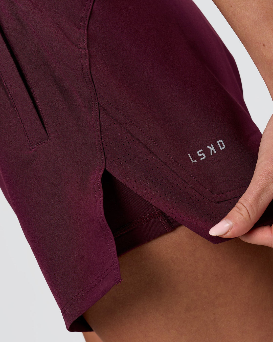 Woman wearing Challenger 5" Lined Performance Short - Cherry Lacquer | Model:Issy | Size:XS - view 9
