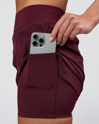 Woman wearing Challenger 5" Lined Performance Short - Cherry Lacquer | Model:Issy | Size:XS | Thumbnail Index: 9