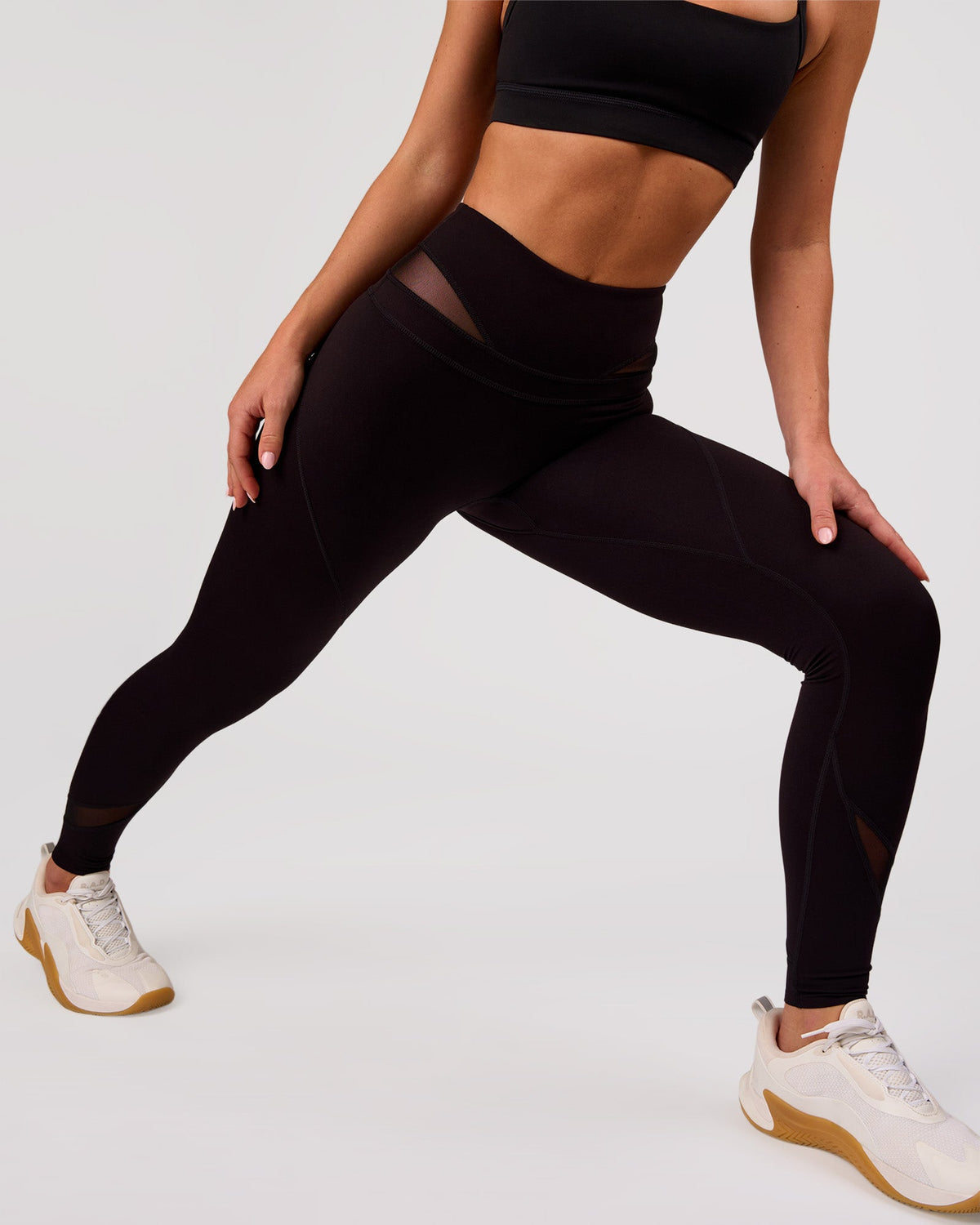 Woman wearing Dare High-Rise Full Length Legging - Black | Model:Issy | Size:XS