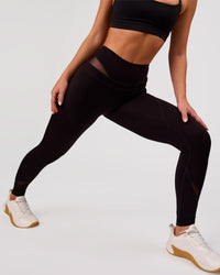 Woman wearing Dare High-Rise Full Length Legging - Black | Model:Issy | Size:XS | Thumbnail Index: 1