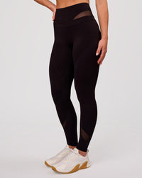 Woman wearing Dare High-Rise Full Length Legging - Black | Model:Issy | Size:XS | Thumbnail Index: 2