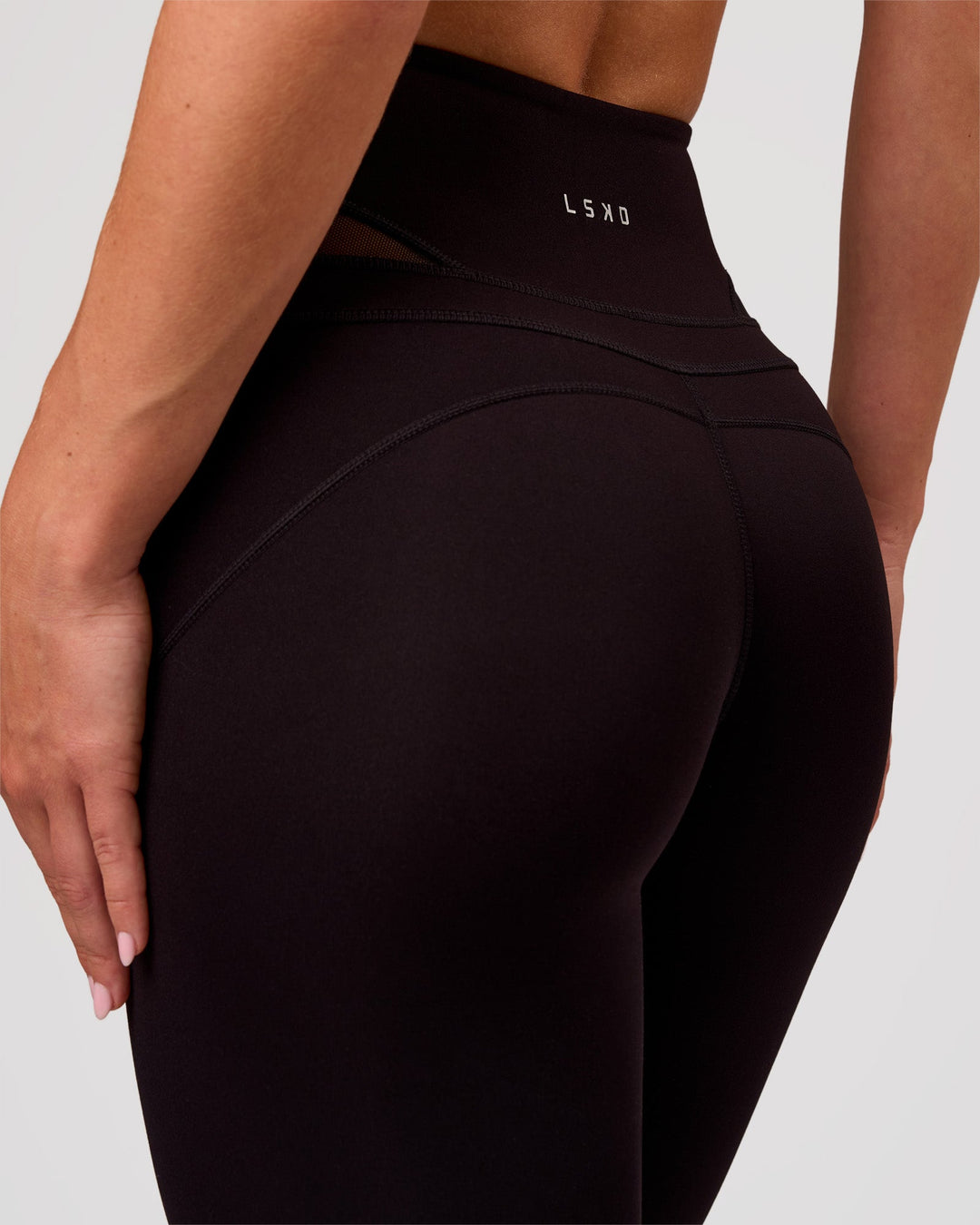 Woman wearing Dare High-Rise Full Length Legging - Black | Model:Issy | Size:XS - view 8