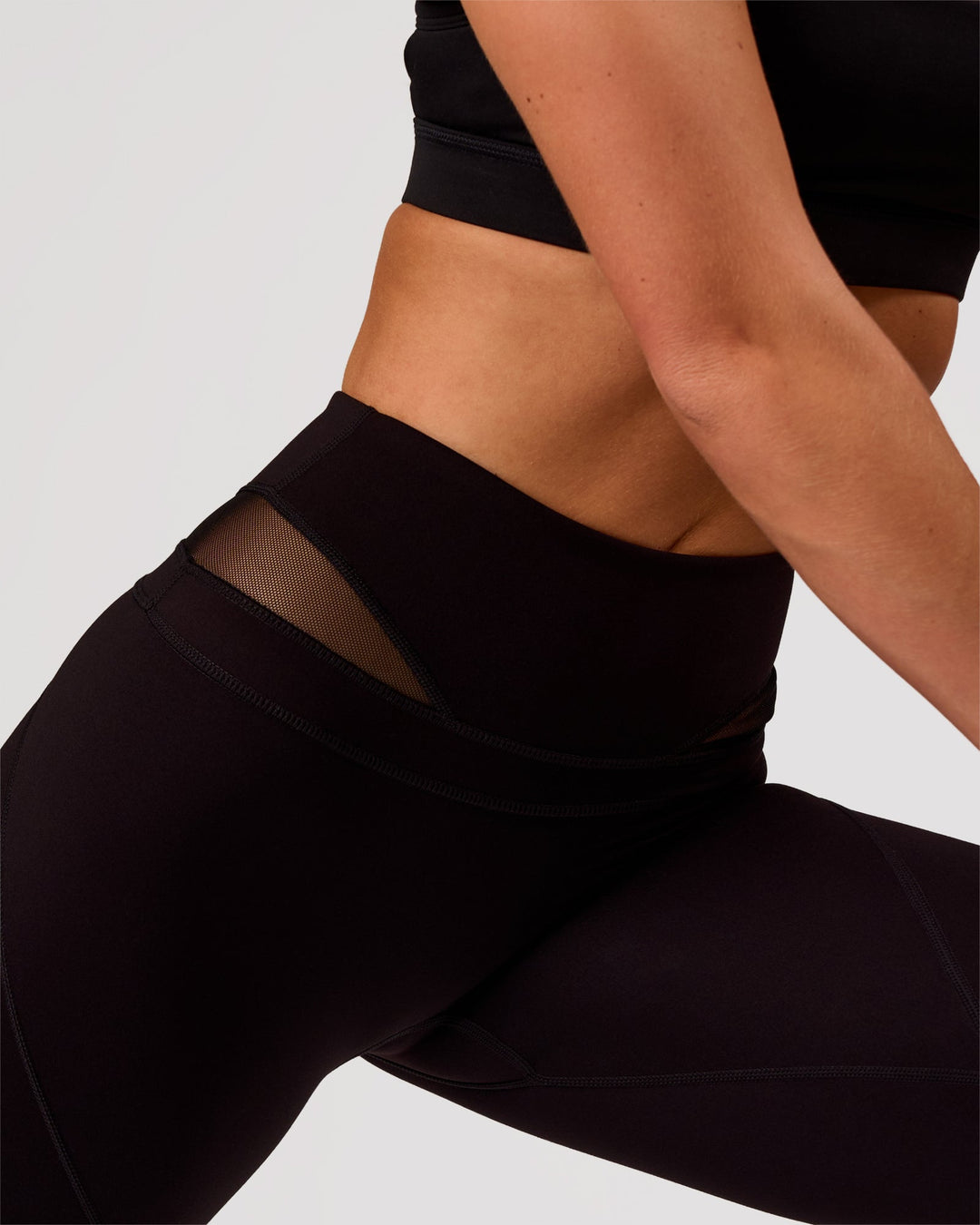 Woman wearing Dare High-Rise Full Length Legging - Black | Model:Issy | Size:XS - view 9