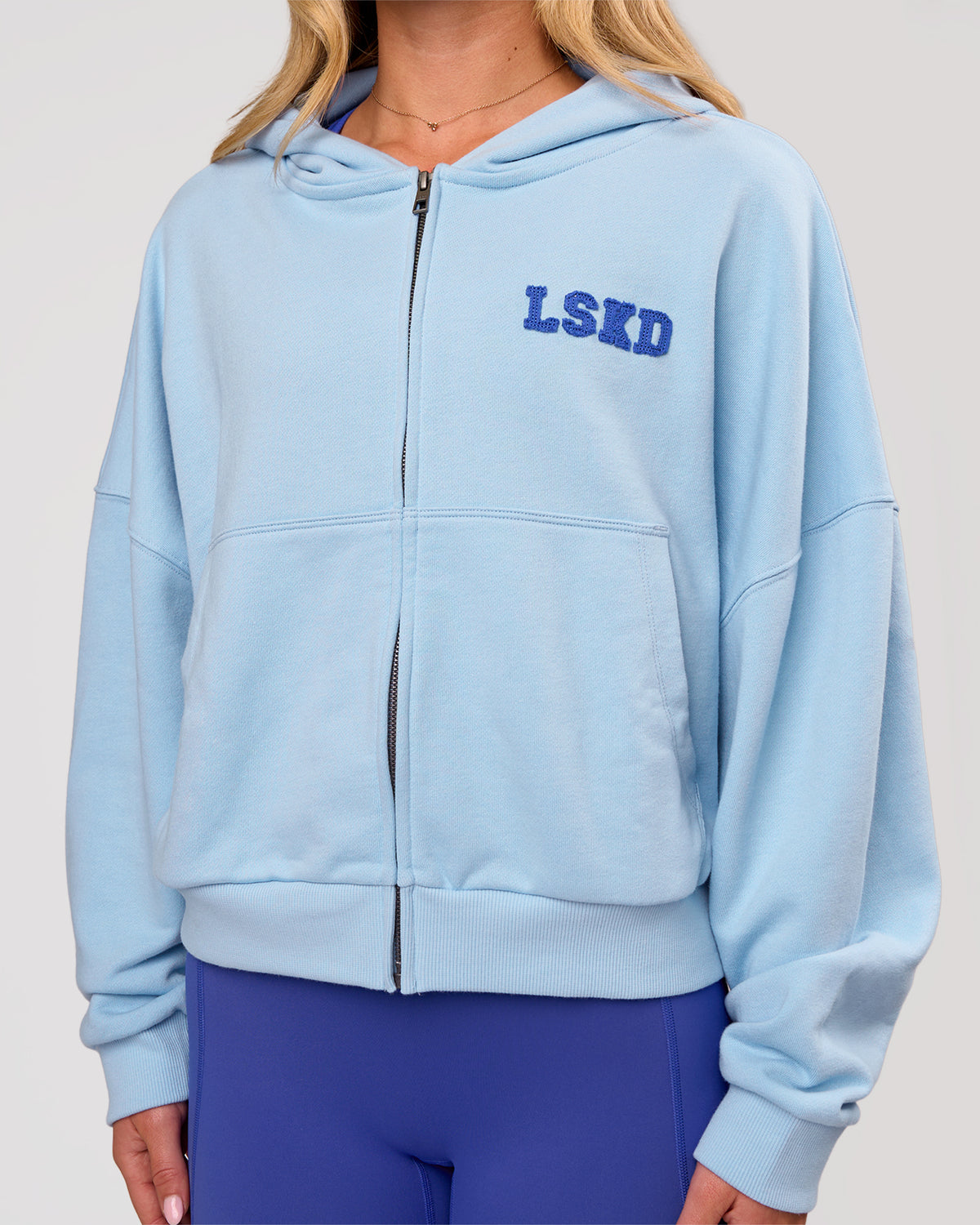 Woman wearing Distress French Terry Full Zip Hoodie - Open Air | Model:Issy | Size:XS