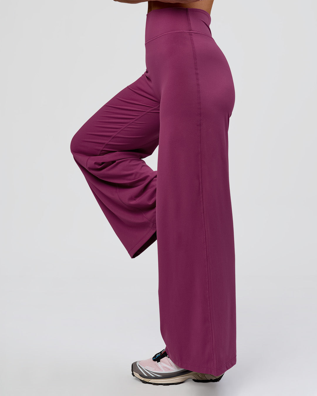 Woman wearing Elixir High-Rise Petite Pant - Boysenberry | Model:Issy | Size:XS - view 5