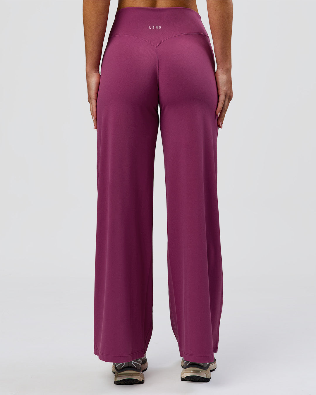 Woman wearing Elixir High-Rise Petite Pant - Boysenberry | Model:Issy | Size:XS - view 7