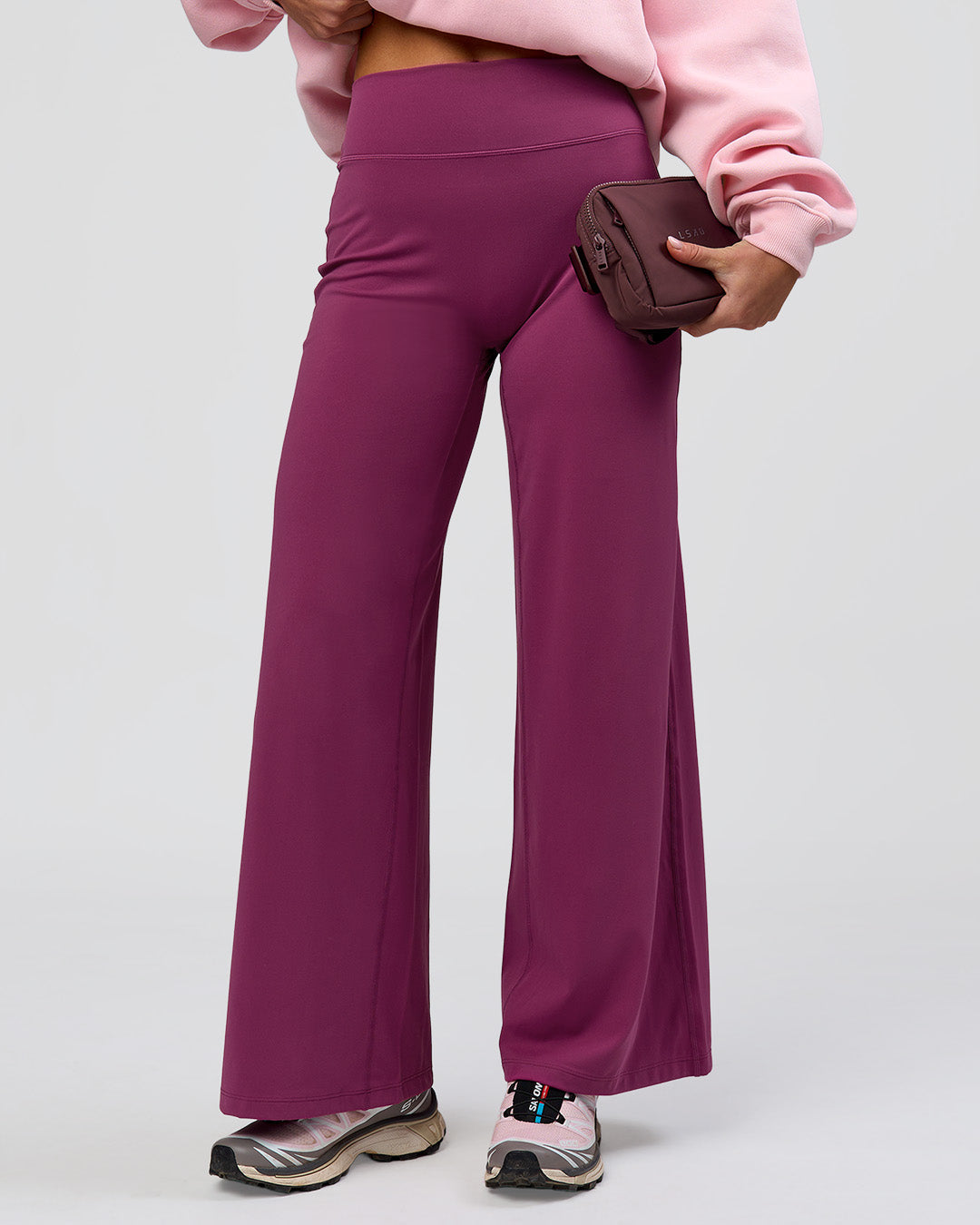 Woman wearing Elixir High-Rise Petite Pant - Boysenberry | Model:Issy | Size:XS - view 8