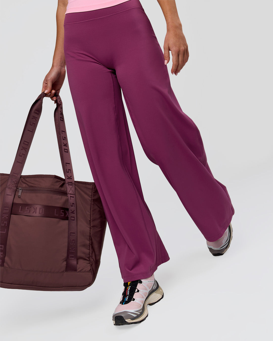 Woman wearing Elixir High-Rise Petite Pant - Boysenberry | Model:Issy | Size:XS - view 9