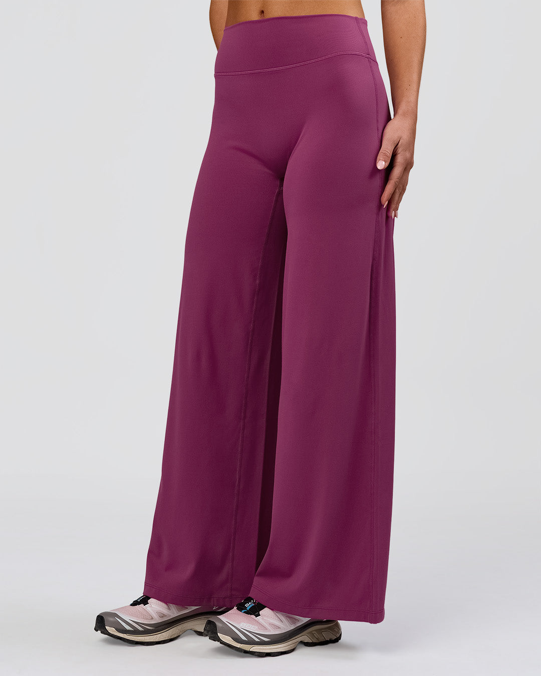 Woman wearing Elixir High-Rise Petite Pant - Boysenberry | Model:Issy | Size:XS - view 13