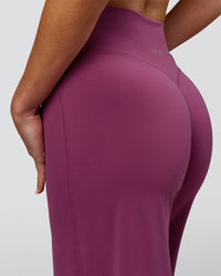 Woman wearing Elixir High-Rise Petite Pant - Boysenberry | Model:Issy | Size:XS | Thumbnail Index: 13