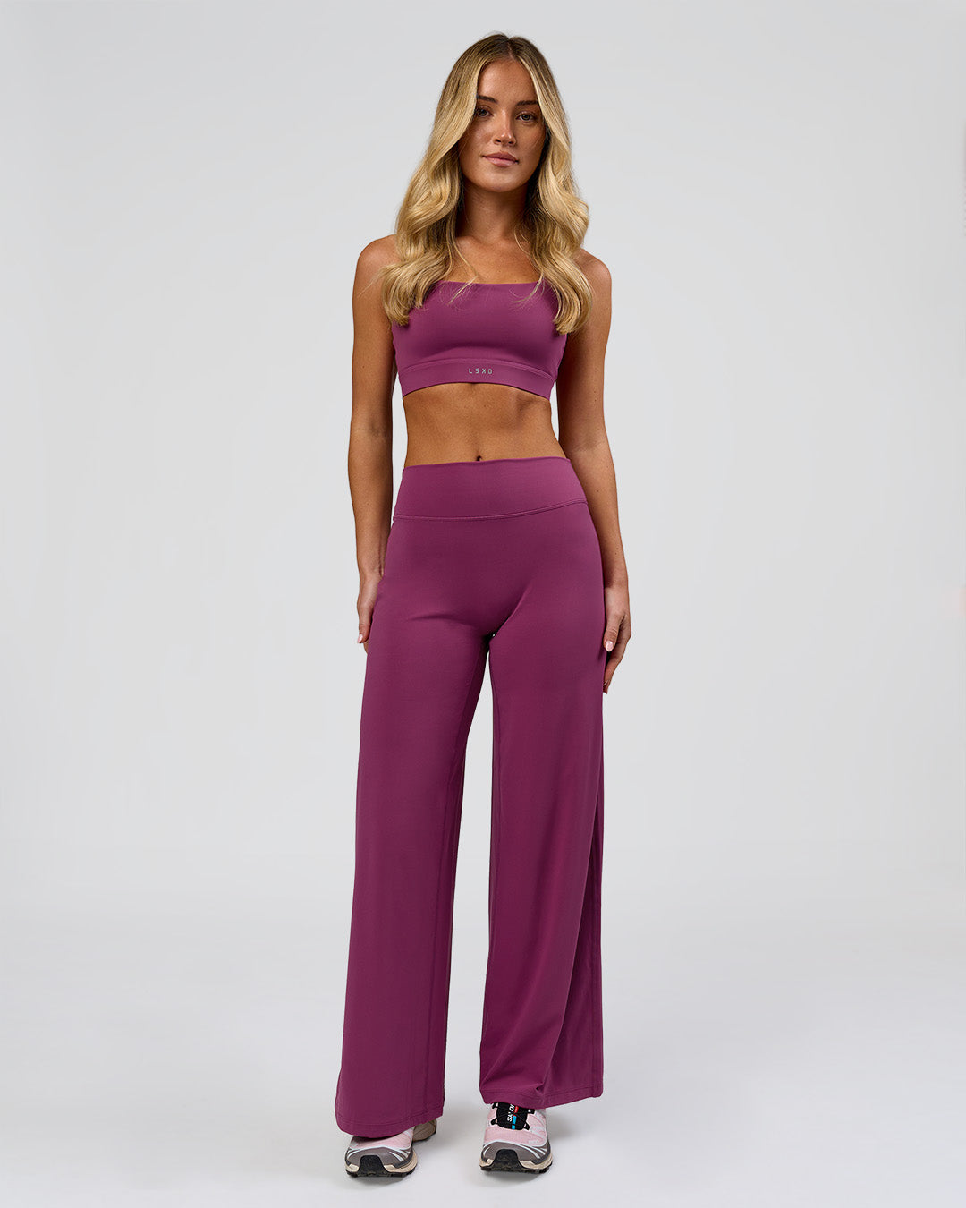 Woman wearing Elixir High-Rise Petite Pant - Boysenberry | Model:Issy | Size:XS - view 4