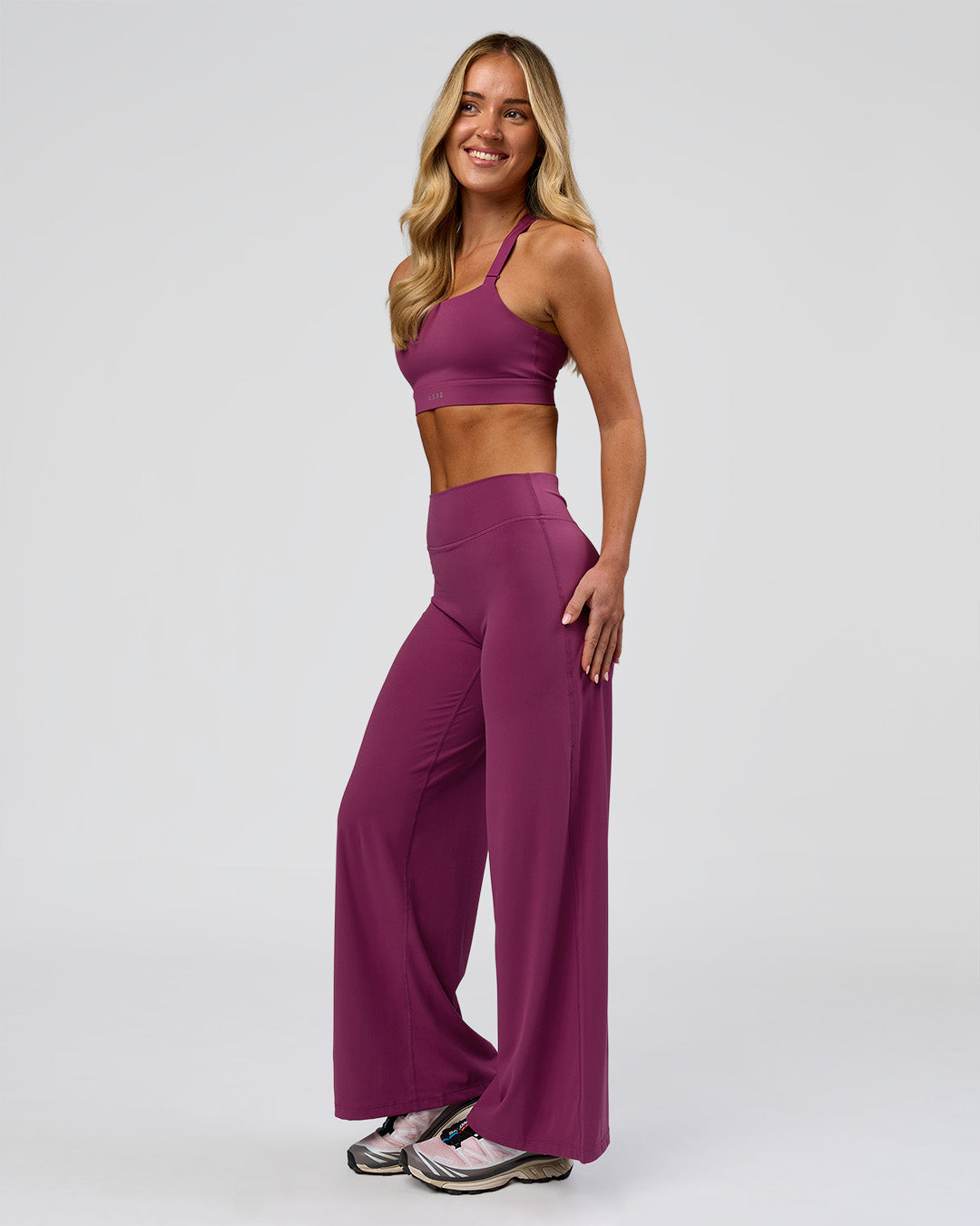 Woman wearing Elixir High-Rise Petite Pant - Boysenberry | Model:Issy | Size:XS - view 17