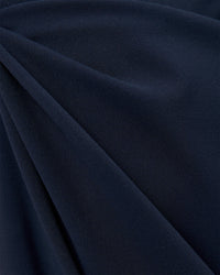 Woman wearing Elixir High-Rise Petite Pant - Midnight Navy | Model:Issy | Size:XS | Thumbnail Index: 10