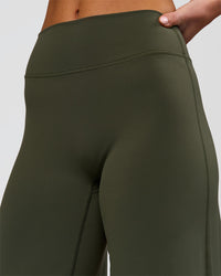 Woman wearing Elixir High-Rise Petite Pant - Pure Olive | Model:Issy | Size:XS | Thumbnail Index: 10