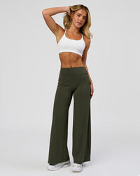 Woman wearing Elixir High-Rise Petite Pant - Pure Olive | Model:Issy | Size:XS | Thumbnail Index: 5