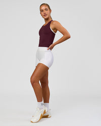 Woman wearing Flow Performance Tank 2.0 - Cherry Lacquer | Model:Issy | Size:XS | Thumbnail Index: 3
