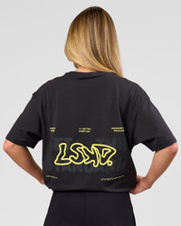 Woman wearing Benchmark FLXCotton Oversized Tee - Onyx-Yellow Fizz | Model:Issy | Size:XS | Thumbnail Index: 9
