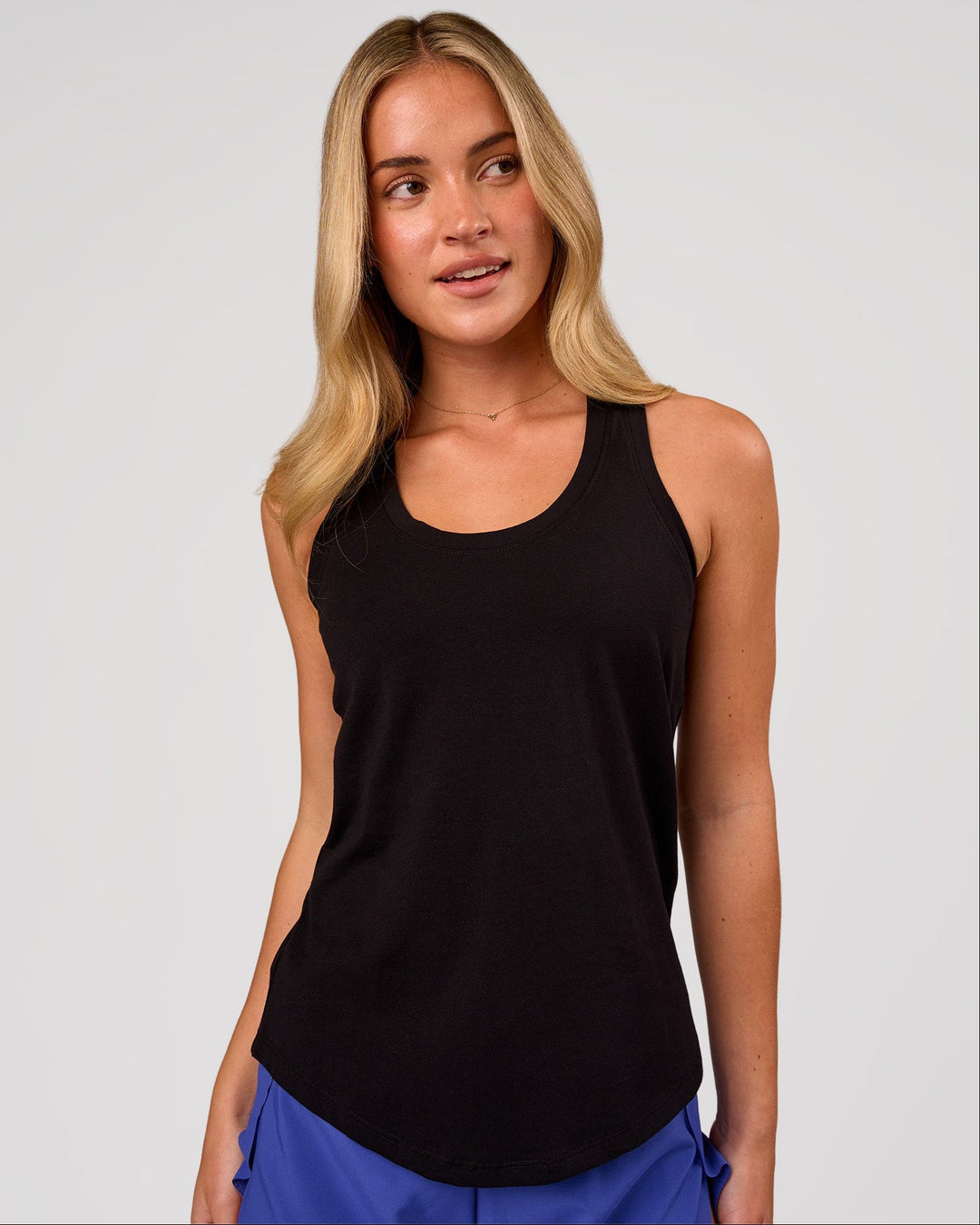 Woman wearing Force FLXCotton Longline Tank - Black | Model:Issy | Size:XS - view 1