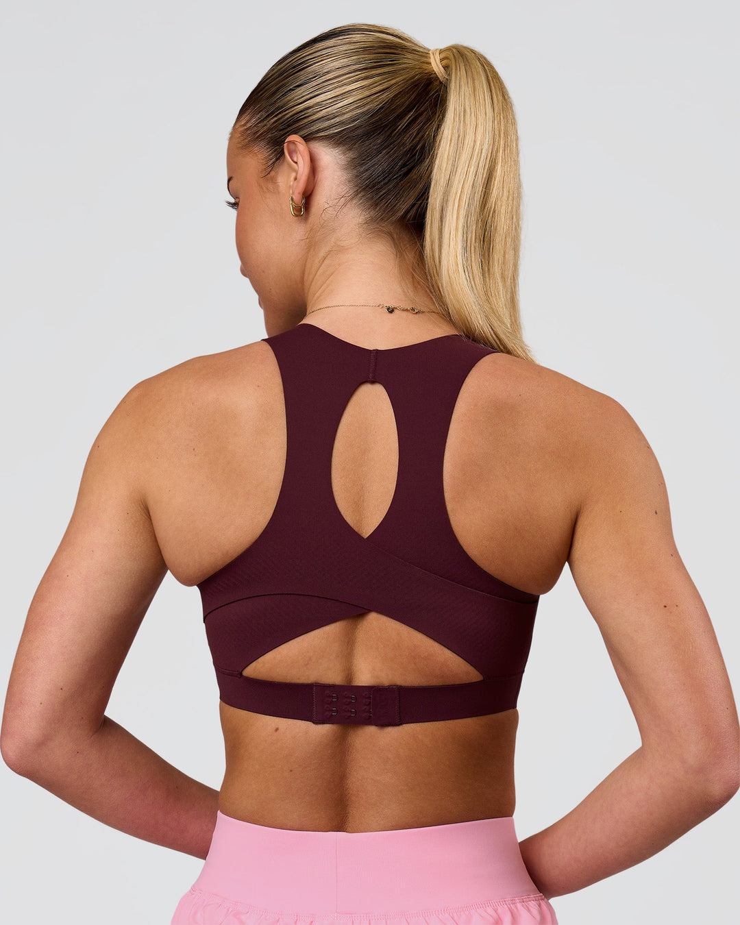 Woman wearing Fusion Sports Bra 2.0 - Cherry Lacquer | Model:Issy | Size:XS - view 2