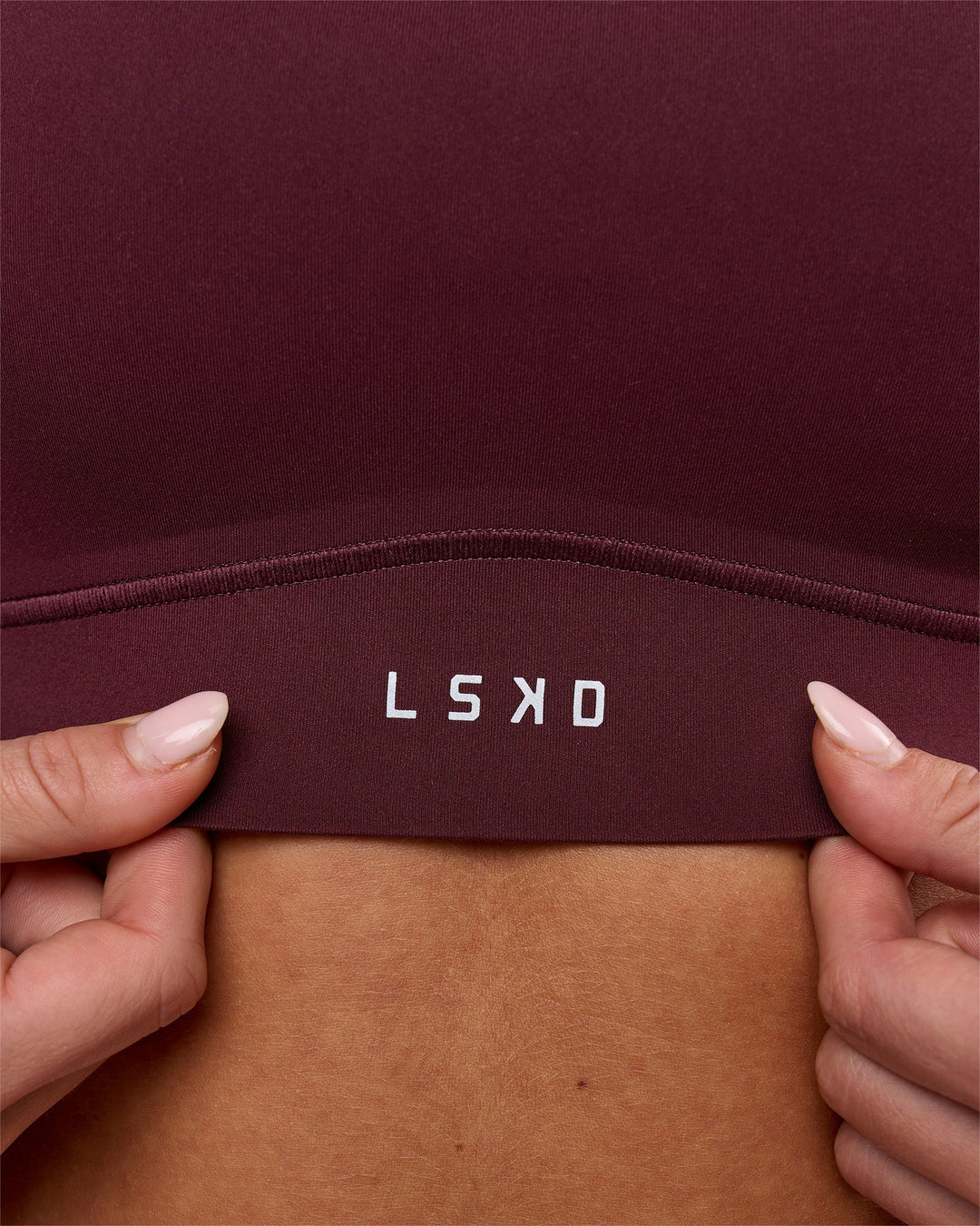 Woman wearing Fusion Sports Bra 2.0 - Cherry Lacquer | Model:Issy | Size:XS - view 7