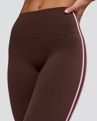 Woman wearing Fusion V-Contour Bind High-Rise Flared Legging - Hot Chocolate-Pink Rose | Model:Issy | Size:XS | Thumbnail Index: 7