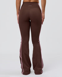 Woman wearing Fusion V-Contour Bind High-Rise Flared Legging - Hot Chocolate-Pink Rose | Model:Issy | Size:XS | Thumbnail Index: 11