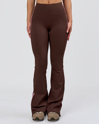 Woman wearing Fusion V-Contour Bind High-Rise Flared Legging - Hot Chocolate-Pink Rose | Model:Issy | Size:XS | Thumbnail Index: 12