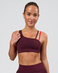 Woman wearing Galvanise Sports Bra 2.0 - Cherry Lacquer-Multi | Model:Issy | Size:XS | Thumbnail Index: 2
