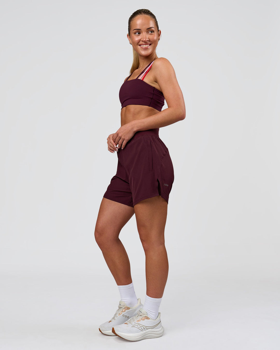 Woman wearing Galvanise Sports Bra 2.0 - Cherry Lacquer-Multi | Model:Issy | Size:XS - view 4