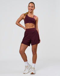Woman wearing Galvanise Sports Bra 2.0 - Cherry Lacquer-Multi | Model:Issy | Size:XS | Thumbnail Index: 5