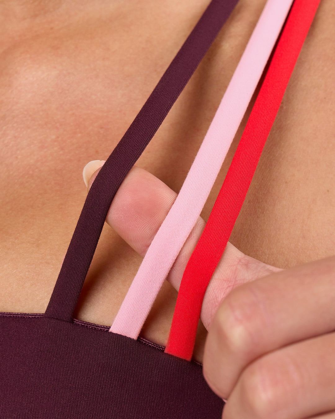 Woman wearing Galvanise Sports Bra 2.0 - Cherry Lacquer-Multi | Model:Issy | Size:XS - view 7