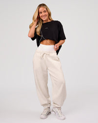 Woman wearing Go-To FLXCotton Oversized Tee - Black-White | Model:Issy | Size:XS | Thumbnail Index: 4