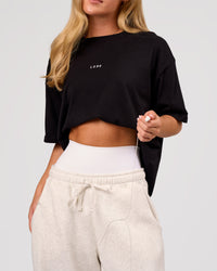 Woman wearing Go-To FLXCotton Oversized Tee - Black-White | Model:Issy | Size:XS | Thumbnail Index: 6