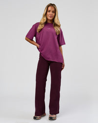 Woman wearing Go-To FLXCotton Oversized Tee - Boysenberry-White | Model:Issy | Size:XS | Thumbnail Index: 1