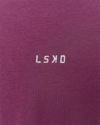 Woman wearing Go-To FLXCotton Oversized Tee - Boysenberry-White | Model:Issy | Size:XS | Thumbnail Index: 3