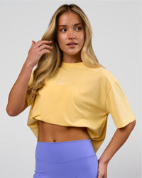 Woman wearing Go-To FLXCotton Oversized Tee - Lemon-White | Model:Issy | Size:XS | Thumbnail Index: 6