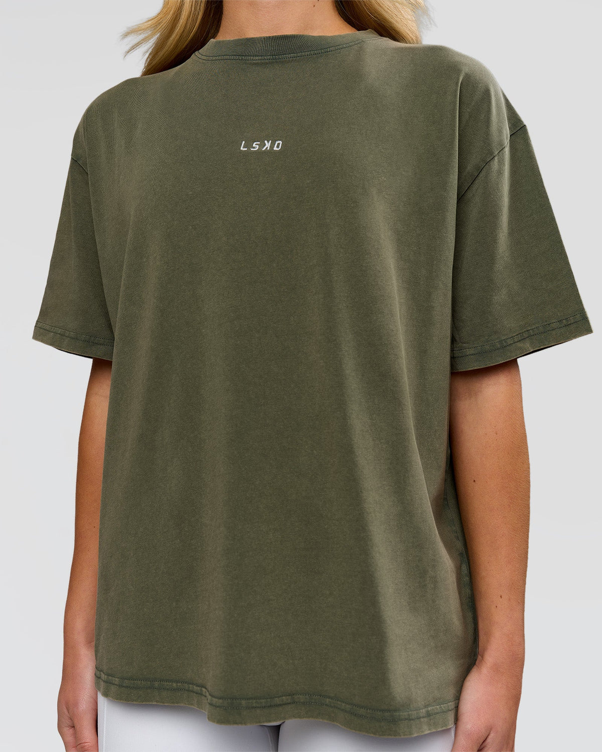 Woman wearing Go-To FLXCotton Oversized Tee - Pure Olive Washed | Model:Issy | Size:XS