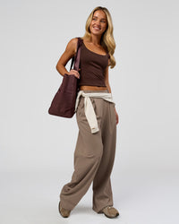 Woman wearing Go-To FLXCotton Rib Scoop Tank - Hot Chocolate | Model:Issy | Size:XS | Thumbnail Index: 9