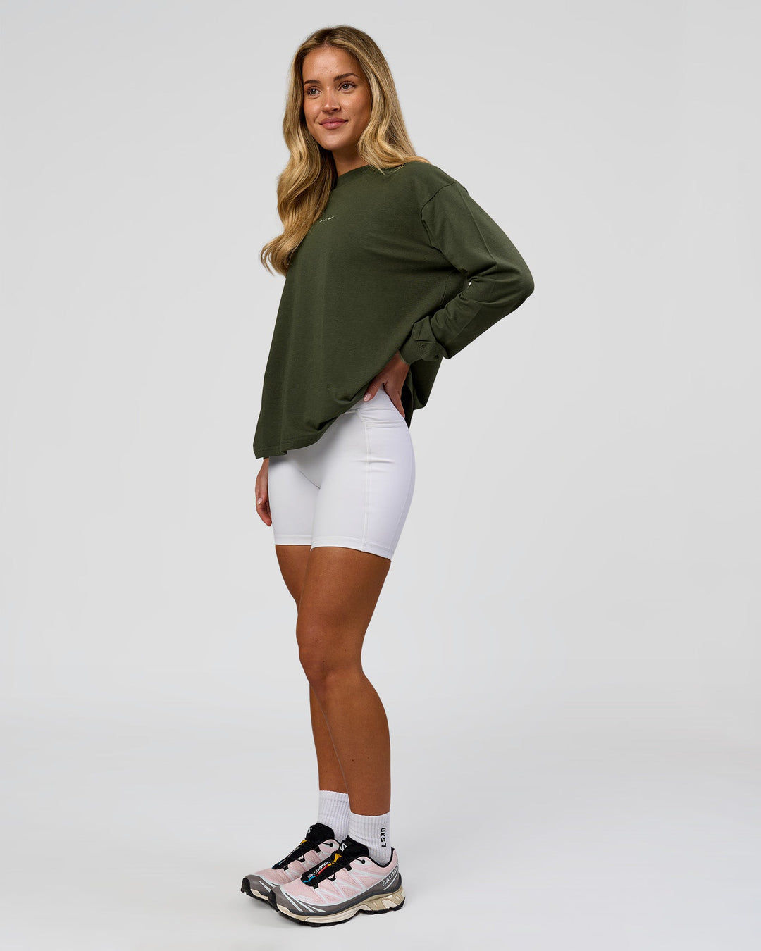 Woman wearing Go-To Long Sleeve FLXCotton Oversized Tee - Pure Olive-White | Model:Issy | Size:XS - view 5