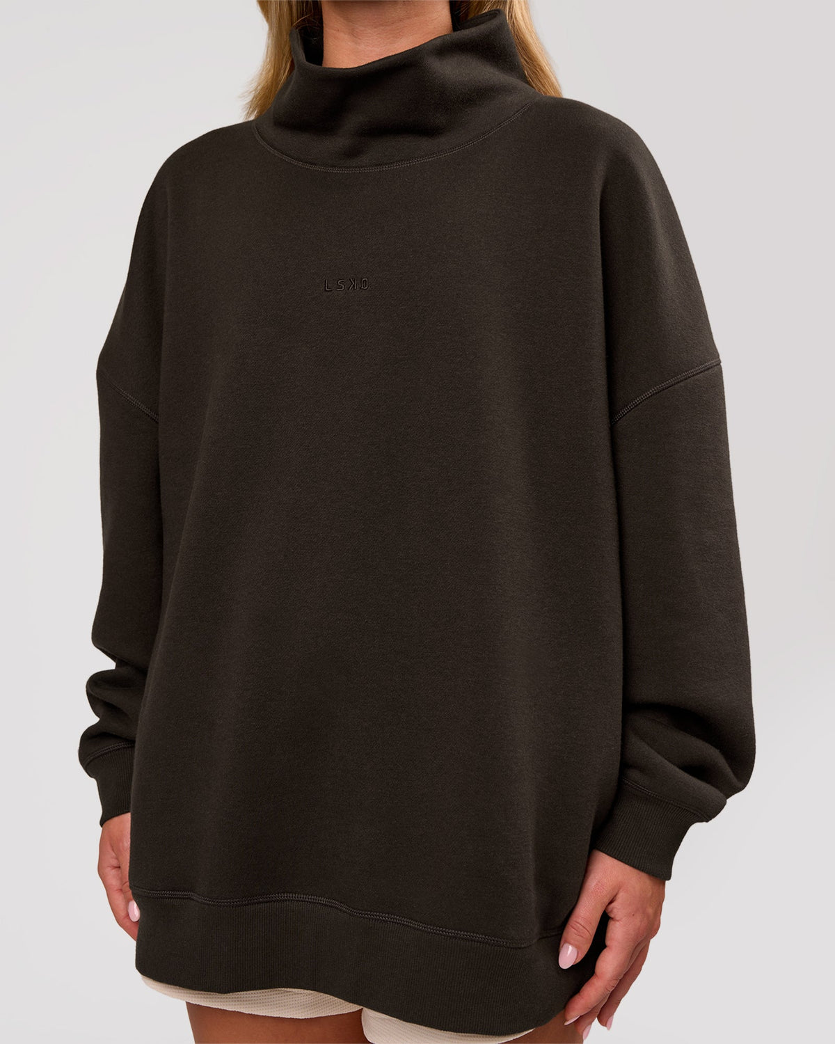 Woman wearing Go-To Oversized Mock Neck Sweater - Ground Coffee | Model:Issy | Size:XS