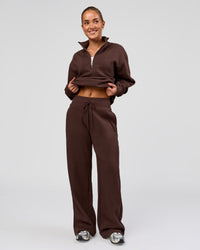 Woman wearing Go-To Oversized Quarter Zip Sweater - Hot Chocolate | Model:Issy | Size:XS