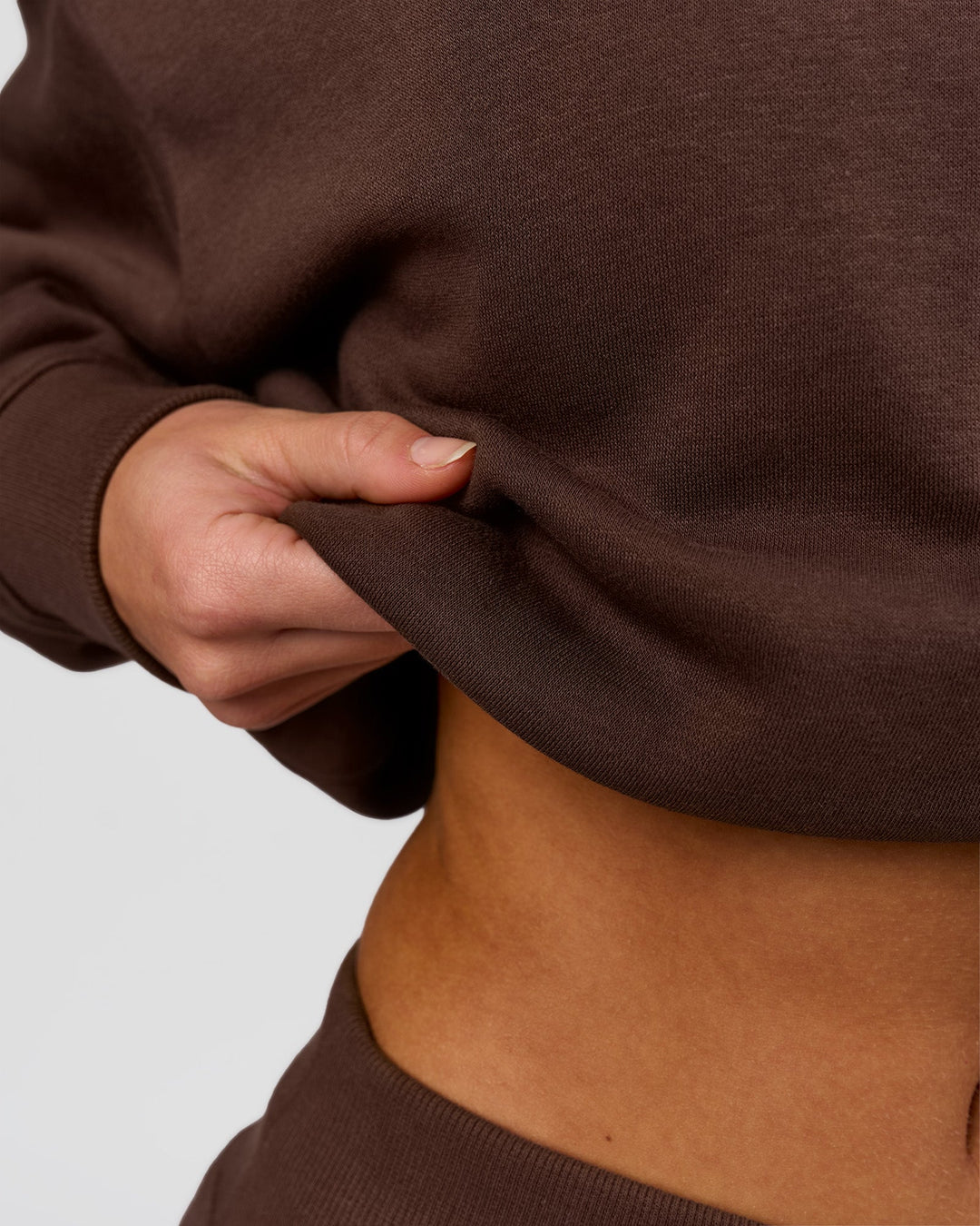 Woman wearing Go-To Oversized Quarter Zip Sweater - Hot Chocolate | Model:Issy | Size:XS