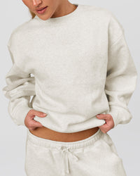 Woman wearing Go-To Oversized Sweater - Silver Marl | Model:Issy | Size:XS | Thumbnail Index: 1