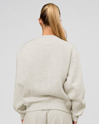 Woman wearing Go-To Oversized Sweater - Silver Marl | Model:Issy | Size:XS | Thumbnail Index: 2