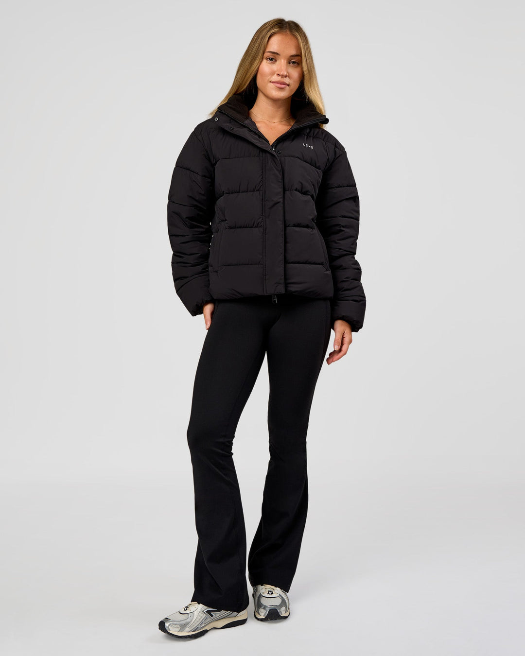 Woman wearing Go-To Puffer Jacket - Black | Model:Issy | Size:XS