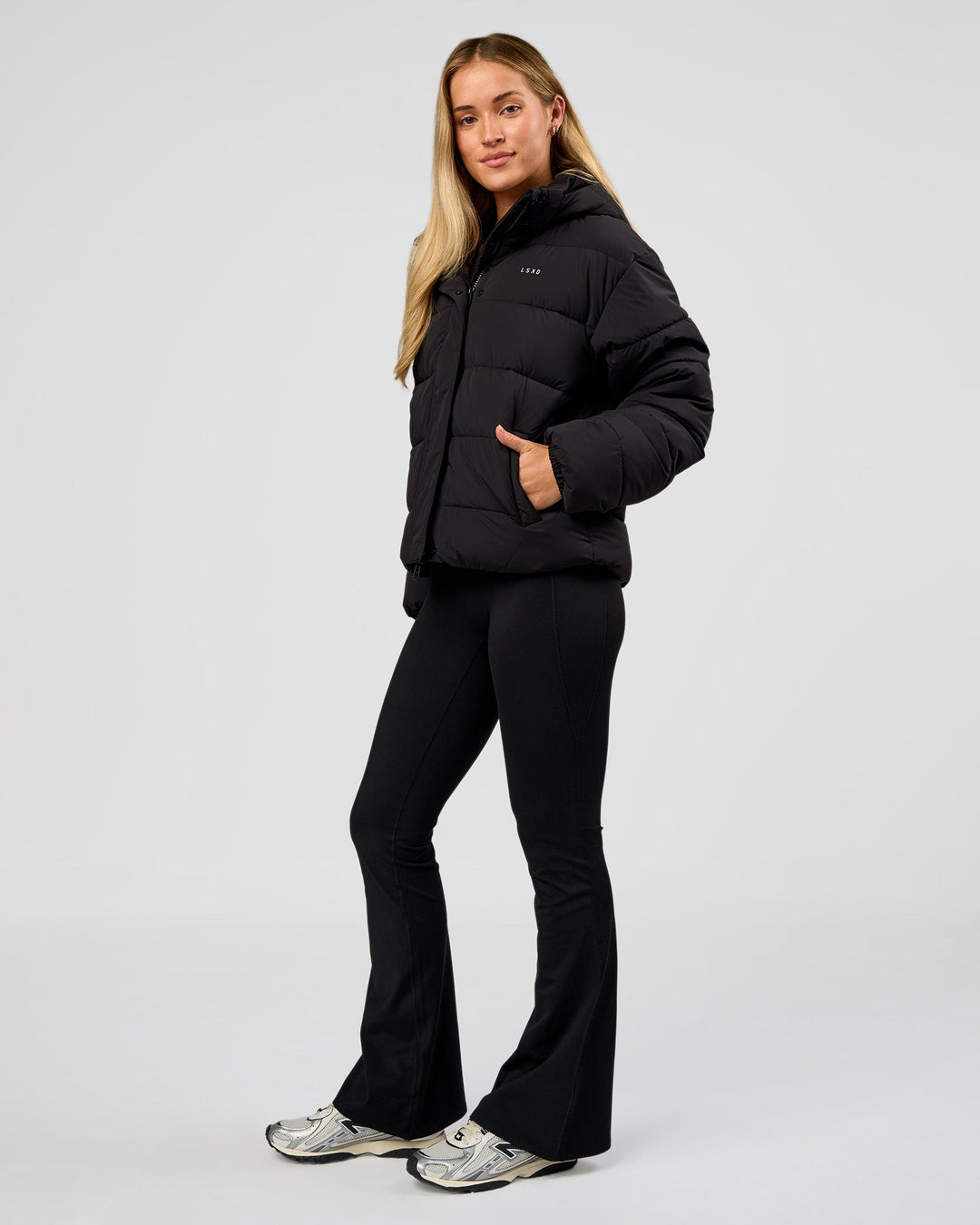 Woman wearing Go-To Puffer Jacket - Black | Model:Issy | Size:XS