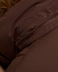 Woman wearing Go-To Puffer Jacket - Hot Chocolate | Model:Issy | Size:XS