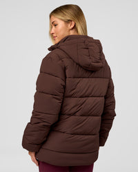 Woman wearing Go-To Puffer Mid Jacket - Hot Chocolate | Model:Issy | Size:XS | Thumbnail Index: 2